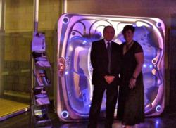 Billy and Claire from HotSpring World Peterborough with the hot tub.